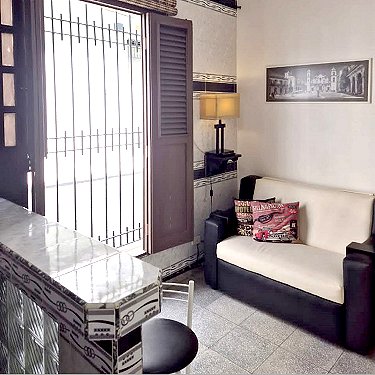 Sala de estar - comedor con sofa cama